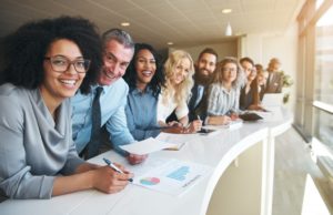 Coworkers looking at the camera