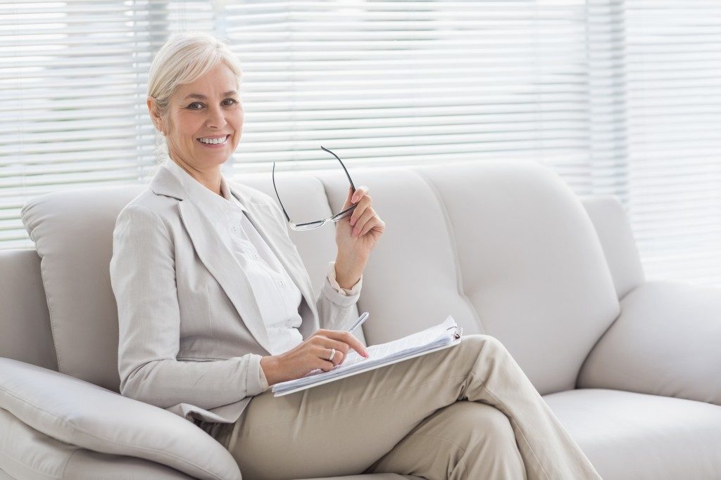 woman sitting on the couch