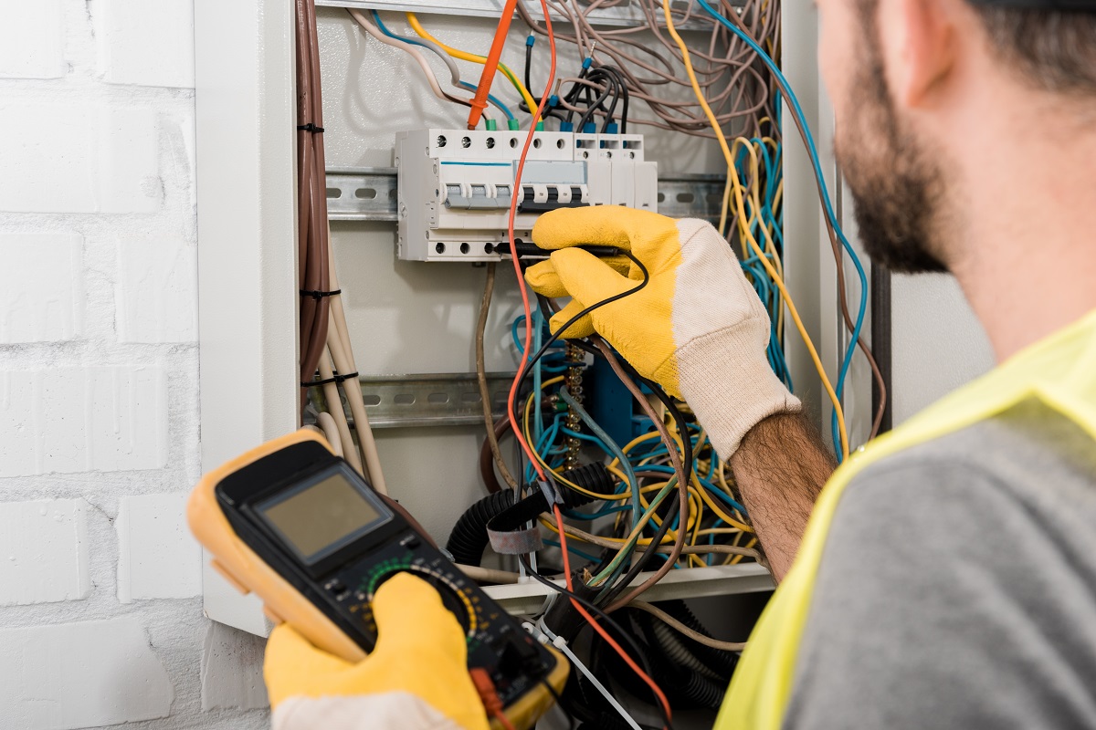 An electrician doing an inspection